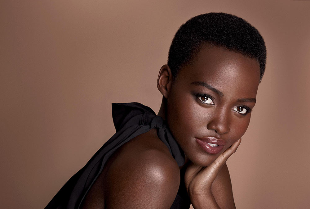 African American lady showing off her natural 4C type hair 