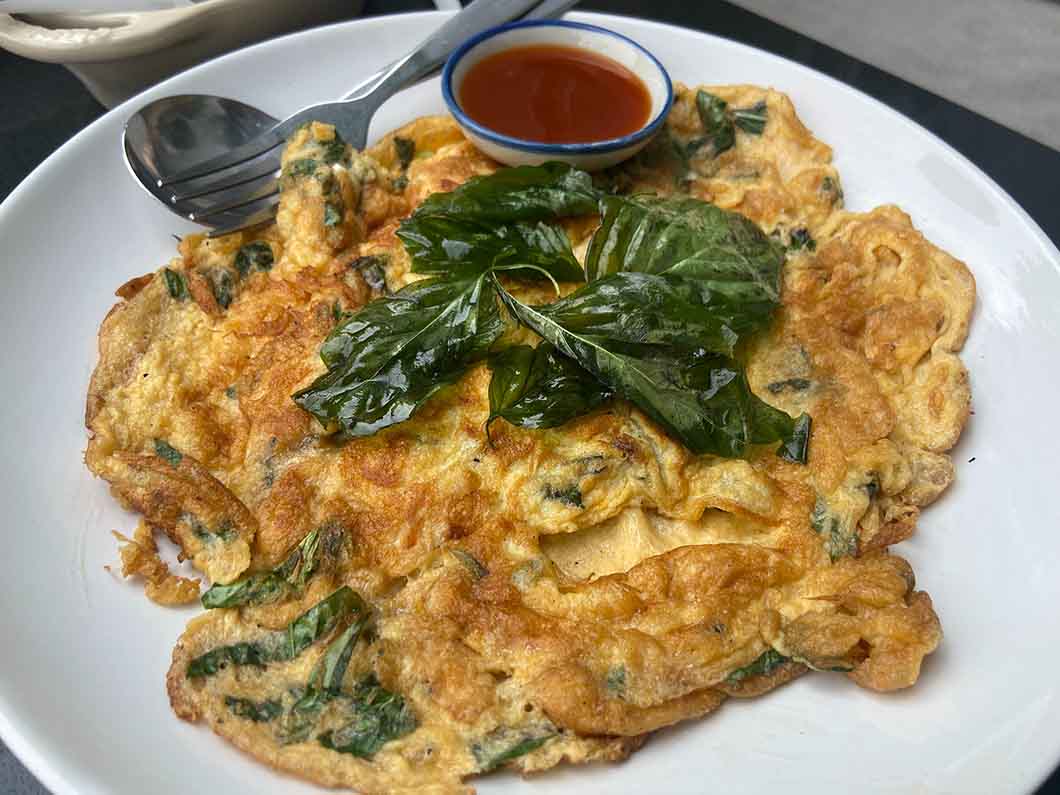 Spinach and Egg Omelette on a plate that is great for iron levels and hair growth
