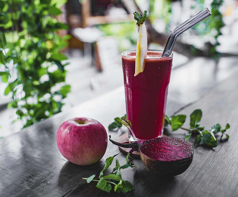 Iron-rich beetroots juiced in a glass to drink for hair growth