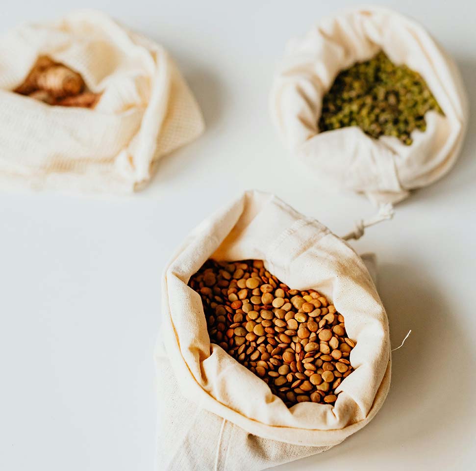 Lentils in tiny white sacks
