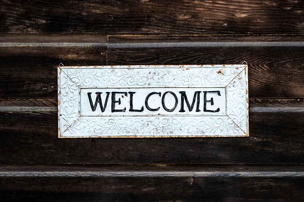 Welcome sign on a board