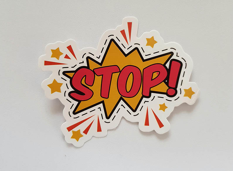 Stop sign to show habits to avoid if you want to manage a dry, itchy scalp
