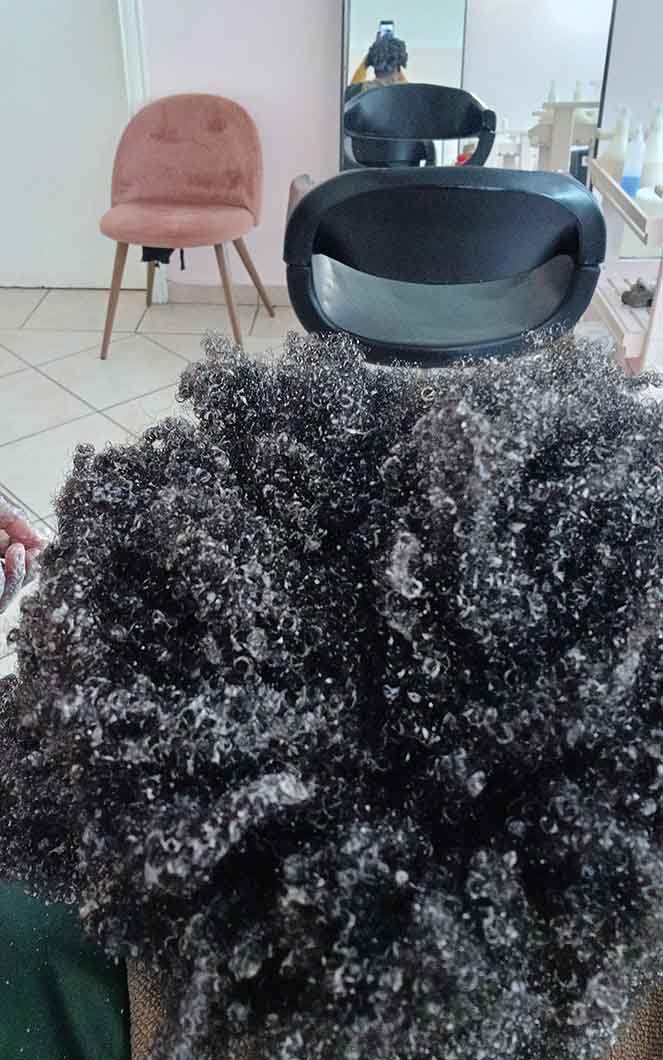 Afro-textured hair with leave-in conditioner