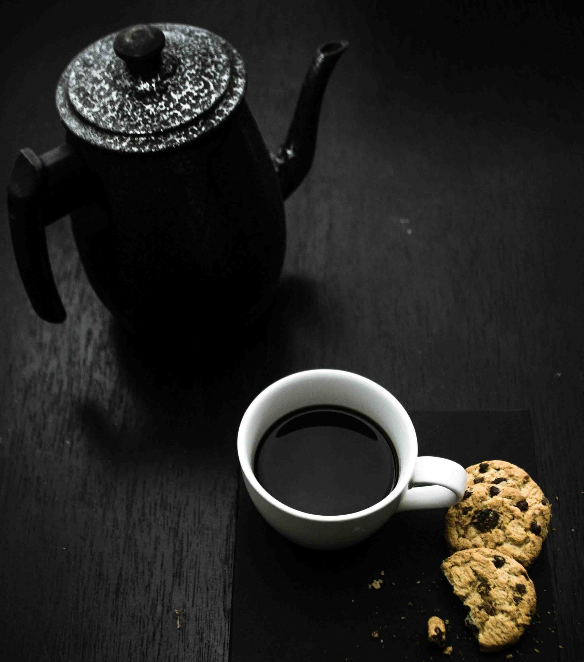 blackstrap molasses in a white tea cup