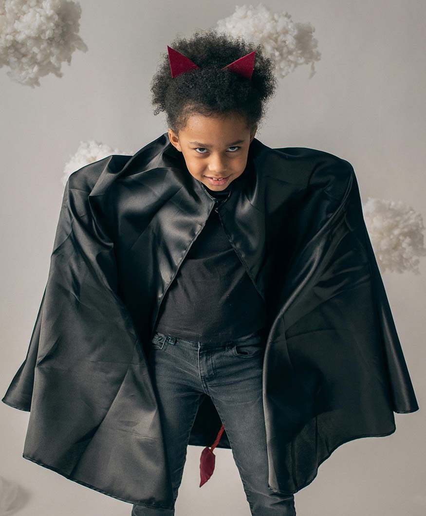 Little girl in a black costume
