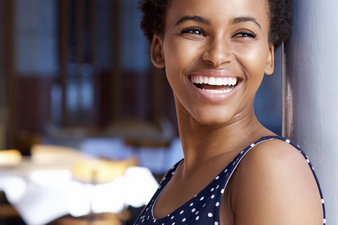 African lady with natural hair in a natural hair salon in Midrand naturalhairzone.com