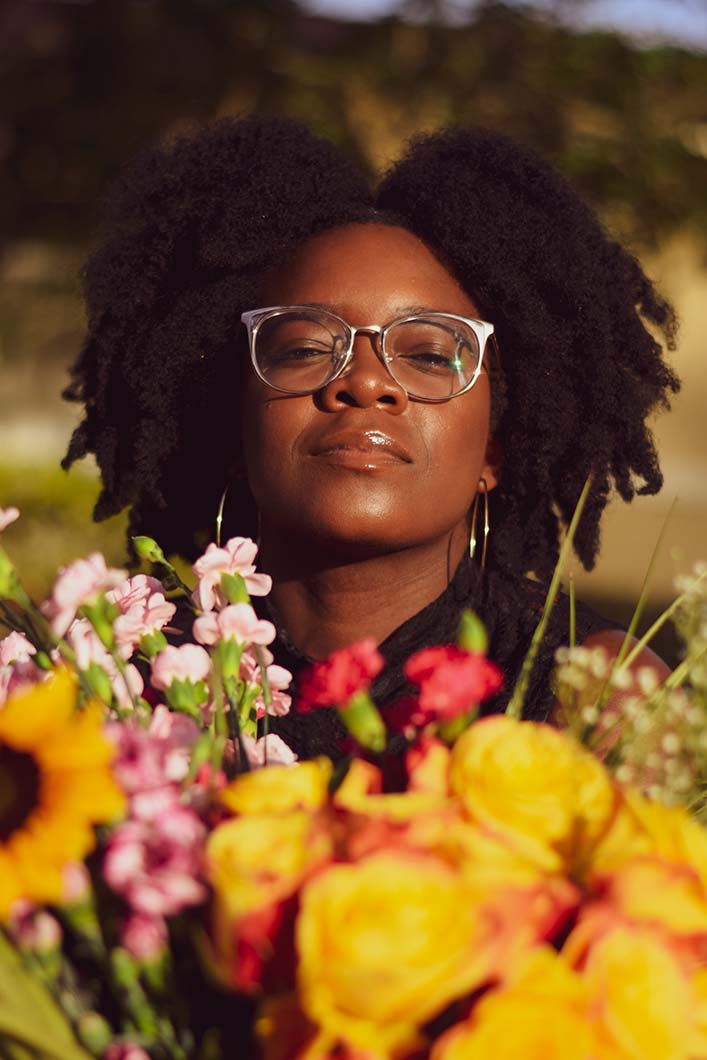 Girl with natural hair stretched with non-heat hair