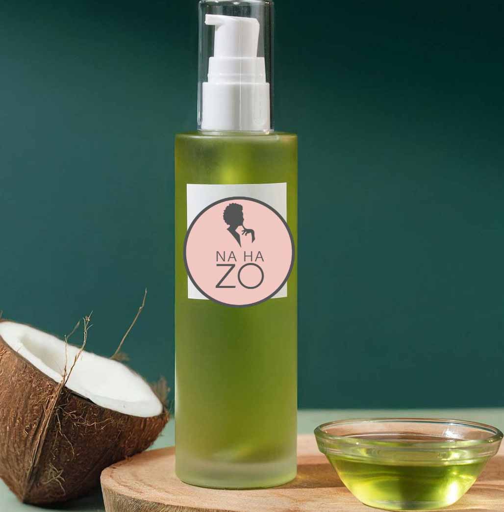 Rosemary, coconut and almond oil blend in a bowl and bottle